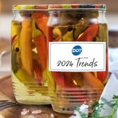 Jar of pickled peppers with label saying, "Dot 2024 Trends"