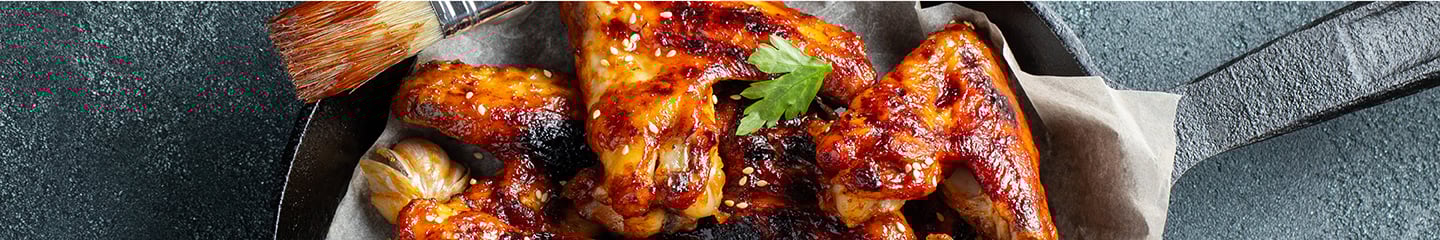 Chicken wings in a skillet