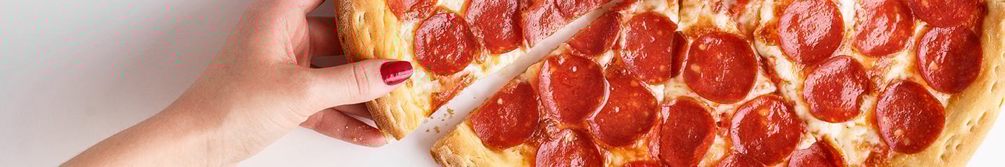 Half of a pepperoni pizza