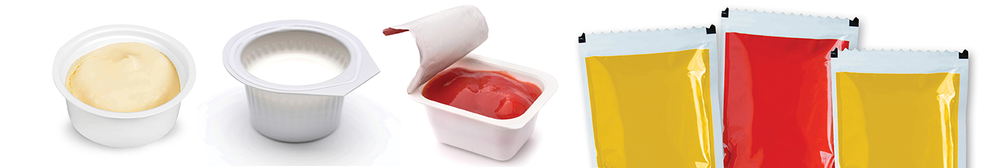 Single serve container of butter, creamer, ketchup, and mustard