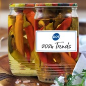 Jar of pickled peppers with label saying, "Dot 2024 Trends"