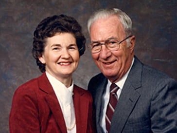 Professional headshot of Dorothy and Robert Tracy, founders of Dot Foods, taken in 2000
